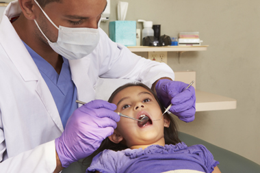 Little girl having check up at seidler family dentistry.